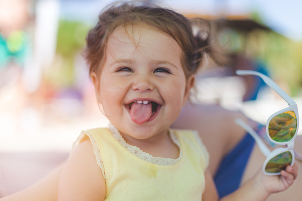 Child sticking out her tongue
