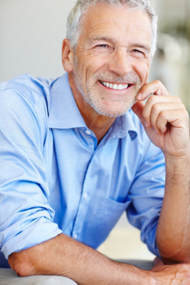 Middle Age Man smiling with hand on chin  middle age  older  mature  senior  smile